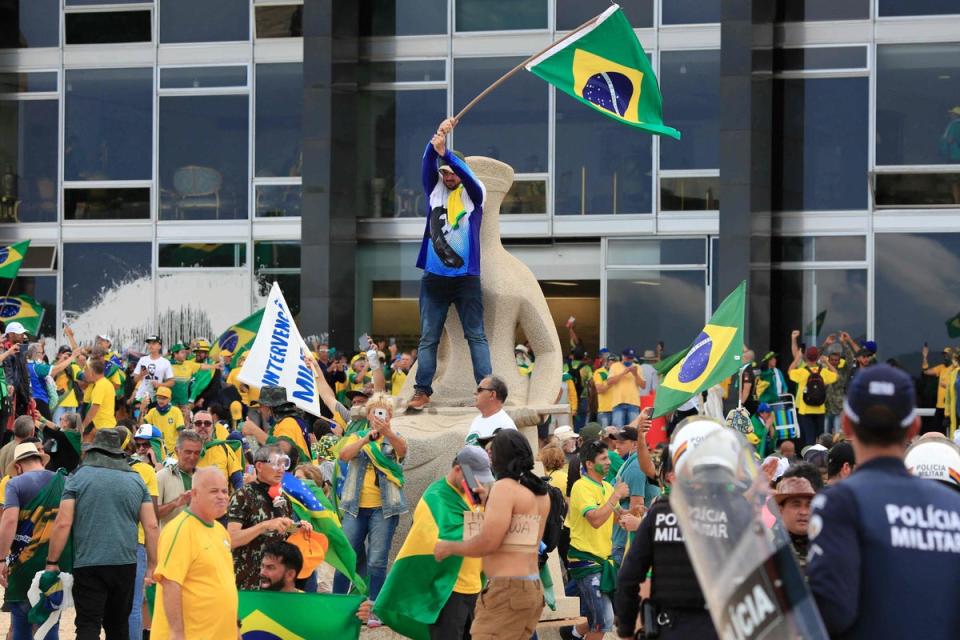 Pro-Bolsonaro supporters invade the Planalto Presidential Palace on Sunday (AFP/Getty)