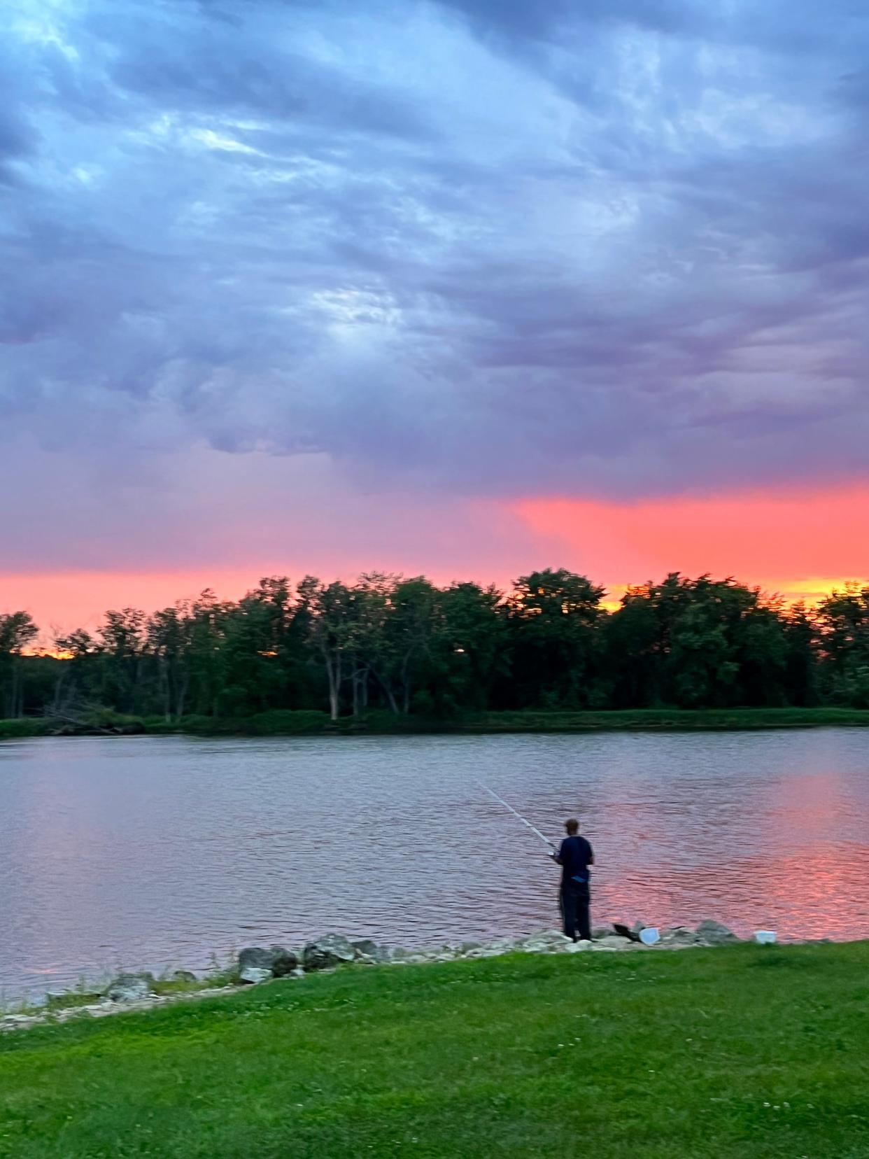 Fishing on the banks of the Mississippi River is among the many activities at the annual Camp "Xhongo" Peace Father and Son and Friends Retreat in De Soto.