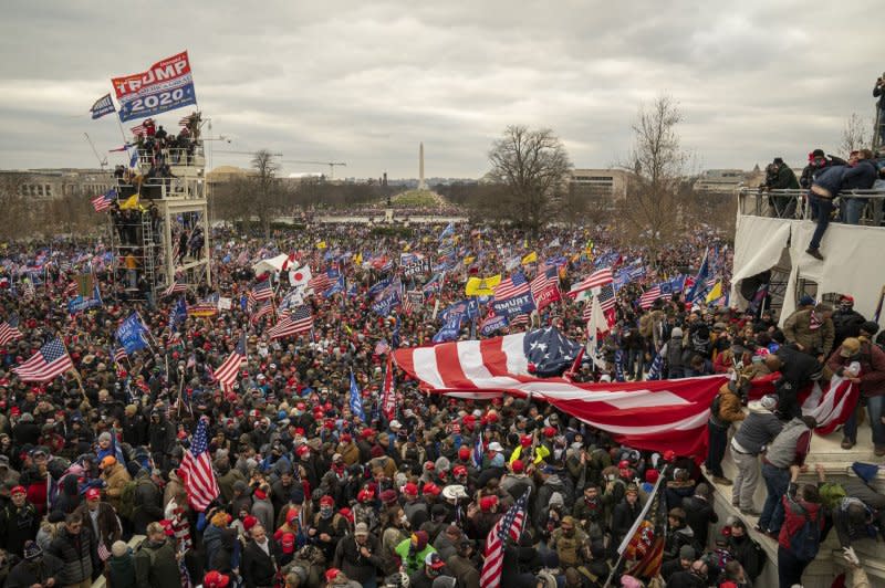 Jeffrey Sabol, a Colorado man who helped drag a police officer into the violent pro-Trump Jan.6 insurrection mob, was sentenced Thursday to 63 months in prison for three felonies. Pro-Trump rioters breached the security perimeter at the U.S. Capitol in Washington, D.C., on Jan. 6, 2021 (pictured). File Photo by Ken Cedeno/UPI