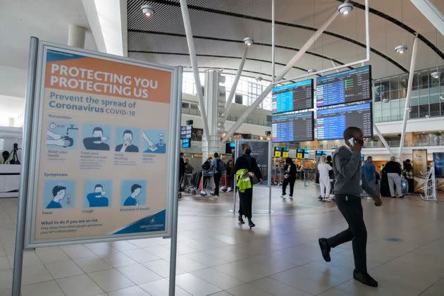 epa09608753 A Coronavirus information board at Cape Town International Airport as restrictions on international flights take effect, Cape Town, South Africa, 28 November 2021. South Africa's foreign ministry has complained it is being punished when it should have been applauded for discovering Omicron. The European Union and countries such as Japan and Israel moved to ban travelers from southern Africa following the discovery of the highly mutated COVID-19 variant, B.1.1.529/Omicron.  EPA/NIC BOTHMA (Photo: NIC BOTHMA EPA)