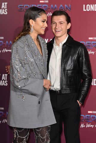 <p>Karwai Tang/WireImage</p> Zendaya and Tom Holland attend a photocall for 'Spiderman: No Way Home'