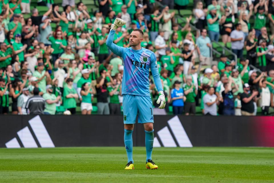 Austin FC goalkeeper Brad Stuver lifts his hand in celebration after last Saturday's 2-0 win over the LA Galaxy at Q2 Stadium. Austin FC has been on a roll, with wins in three of its last four matches, but must play at Vancouver on Saturday.