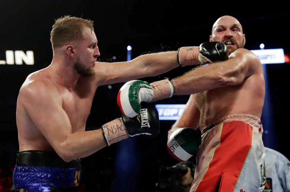 Otto Wallin (left) surprised many by holding his own against Tyson Fury on September 14.  AP Photo / Isaac Brekken