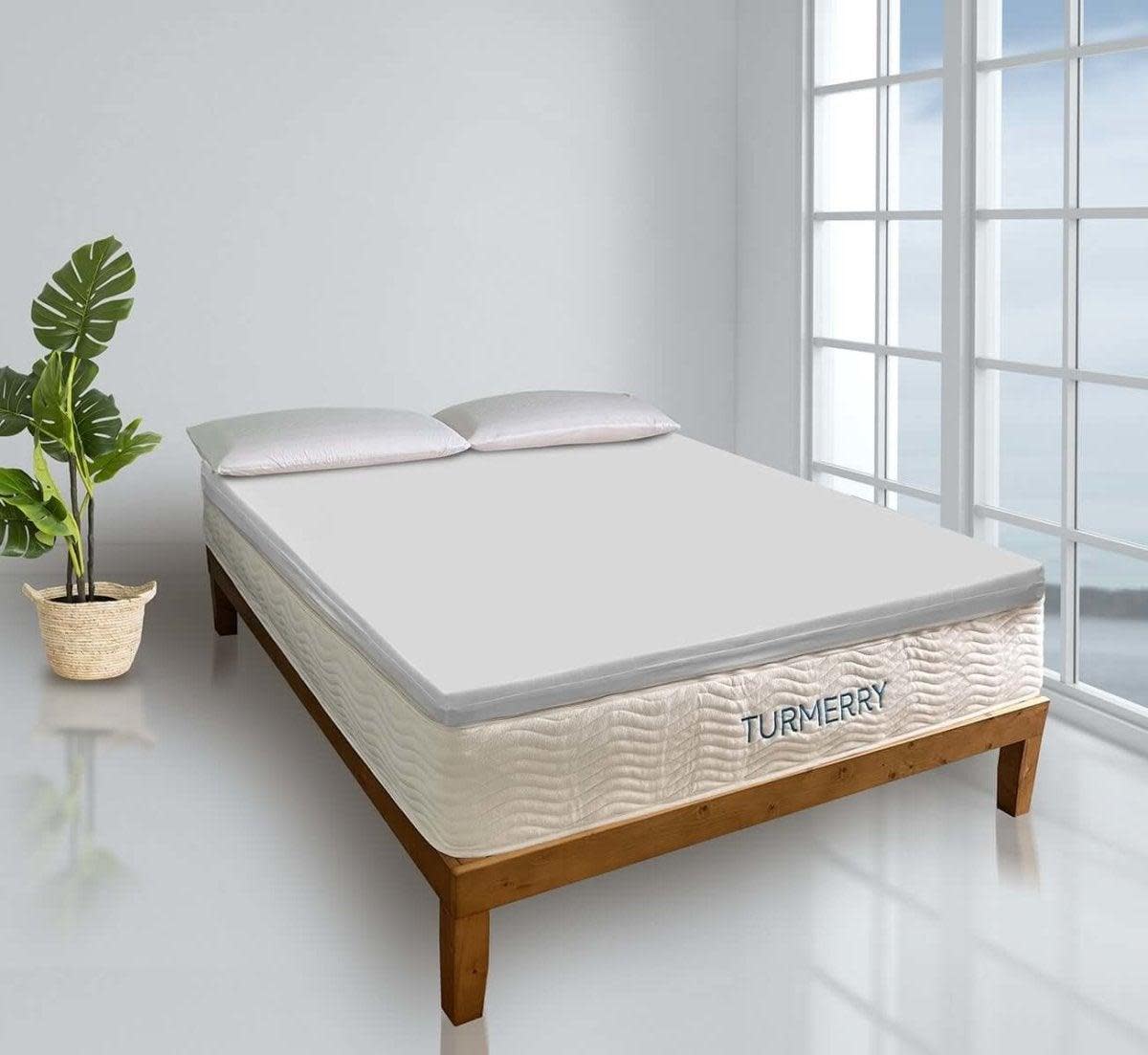 <p><a href="https://go.redirectingat.com?id=74968X1596630&url=https%3A%2F%2Fwww.turmerry.com%2Fproducts%2Fnatural-dunlop-latex-mattress-topper%3Fvariant%3D30877297737837&sref=https%3A%2F%2Fwww.goodhousekeeping.com%2Fhome-products%2Fg40177072%2Fbest-latex-mattress-toppers%2F" rel="nofollow noopener" target="_blank" data-ylk="slk:Shop Now;elm:context_link;itc:0;sec:content-canvas" class="link rapid-noclick-resp">Shop Now</a></p><p>Organic Latex Mattress Topper</p><p>turmerry.com</p><p>$189.00</p><span class="copyright">Turmerry</span>