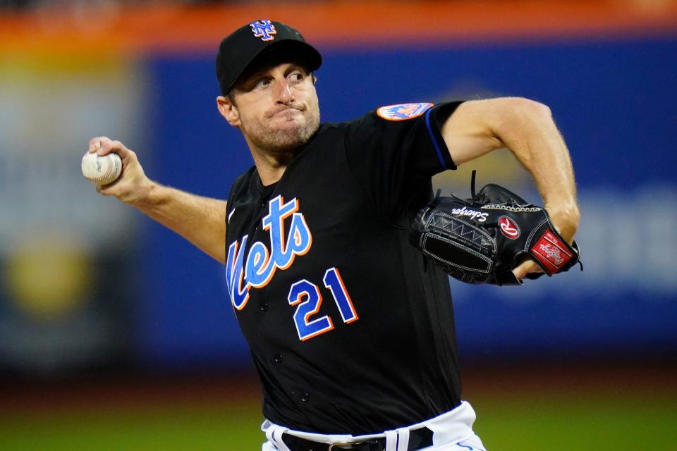 New York Mets' Max Scherzer (21) pitches during the first inning of a baseball game against the Seattle Mariners Friday, May 13, 2022, in New York. (AP Photo/Frank Franklin II)