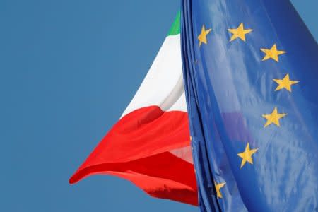 European Union and Italian flags are seen in downtown Rome, Italy, October 19, 2018.   REUTERS/Alessandro Bianchi