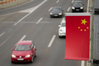 Chinese flags fly on lampposts, days before the visit of Chinese President Xi Jinping in Belgrade, Serbia, Wednesday, May 1, 2024. Chinese leader Xi Jinping's visit to European ally Serbia on Tuesday falls on a symbolic date: the 25th anniversary of the bombing of the Chinese Embassy in Belgrade during NATO's air war over Kosovo. (AP Photo/Darko Vojinovic)