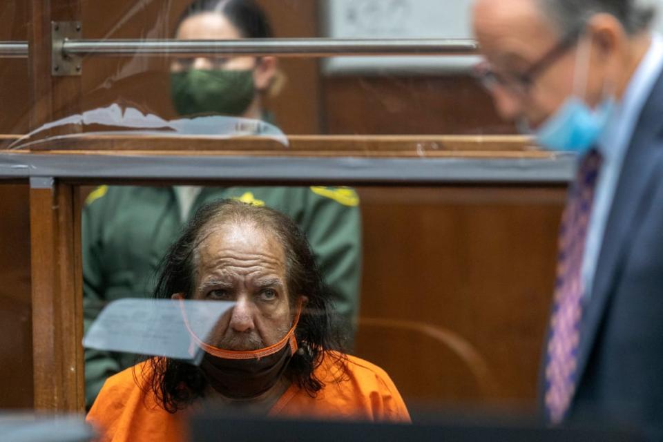 <div class="inline-image__caption"><p>Ron Jeremy listens as his attorney Stuart Goldfarb speaks during his arraignment on rape and sexual assault charges at Clara Shortridge Foltz Criminal Justice Center on June 26, 2020, in Los Angeles, California. </p></div> <div class="inline-image__credit">David McNew/AFP/Getty</div>