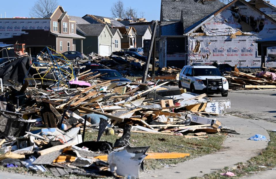 A Montgomery County Sheriff unit patrols a neighborhood on Monday, Dec. 11, 2023, in Clarksville, Tenn. Tornadoes struck Middle Tennessee causing catastrophic damage and killing six people Saturday.