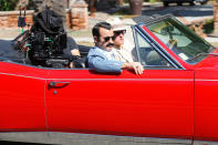 <p>Justin Theroux and Woody Harrelson film scenes for <em>The White House Plumbers</em> in a red convertible on Oct. 13 in L.A.</p>