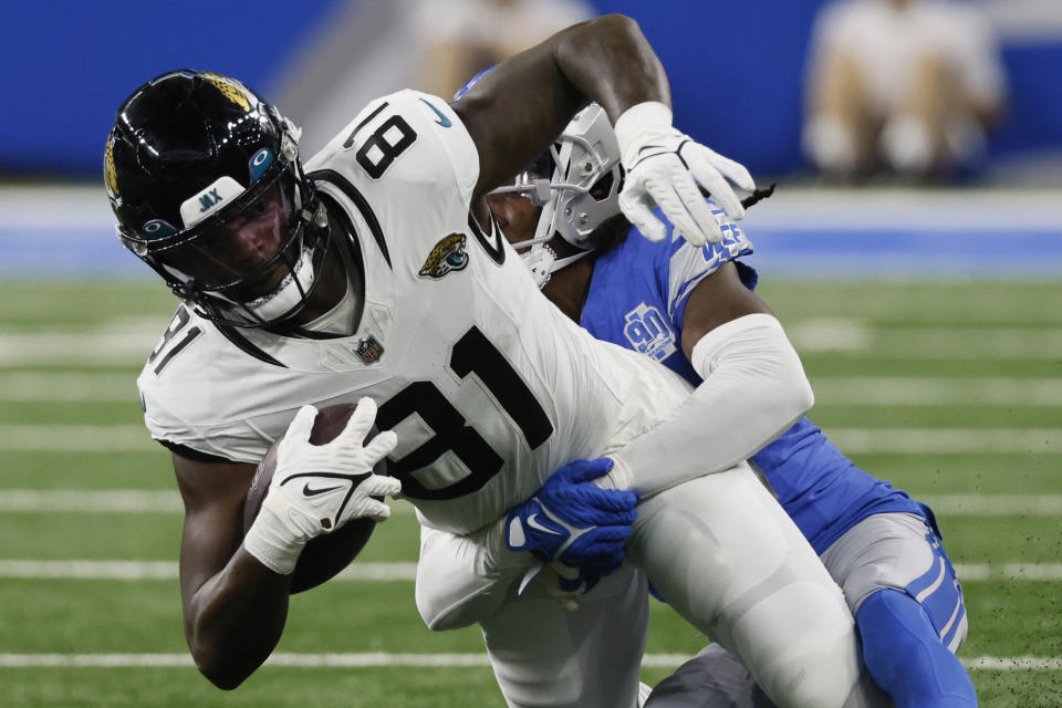 Detroit Lions cornerback Steven Gilmore hits Jacksonville Jaguars wide receiver Seth Williams (81) during the first half of a preseason NFL football game, Saturday, Aug. 19, 2023, in Detroit. (AP Photo/Duane Burleson)