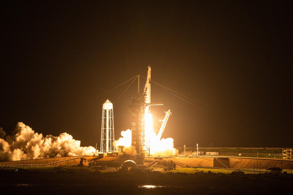 The SpaceX Falcon 9 rocket carrying the Inspiration4 crew launches into space