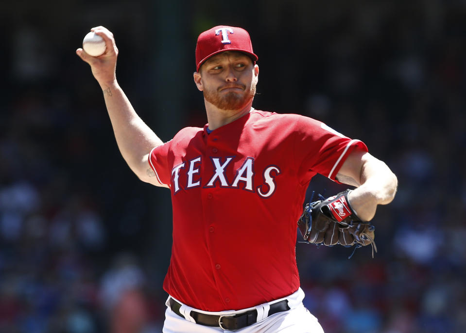 Texas Rangers starting pitcher Shelby Miller delivers against the Houston Astros during the first inning of a baseball game Sunday, April 21, 2019, in Arlington, Texas. (AP Photo/Mike Stone)