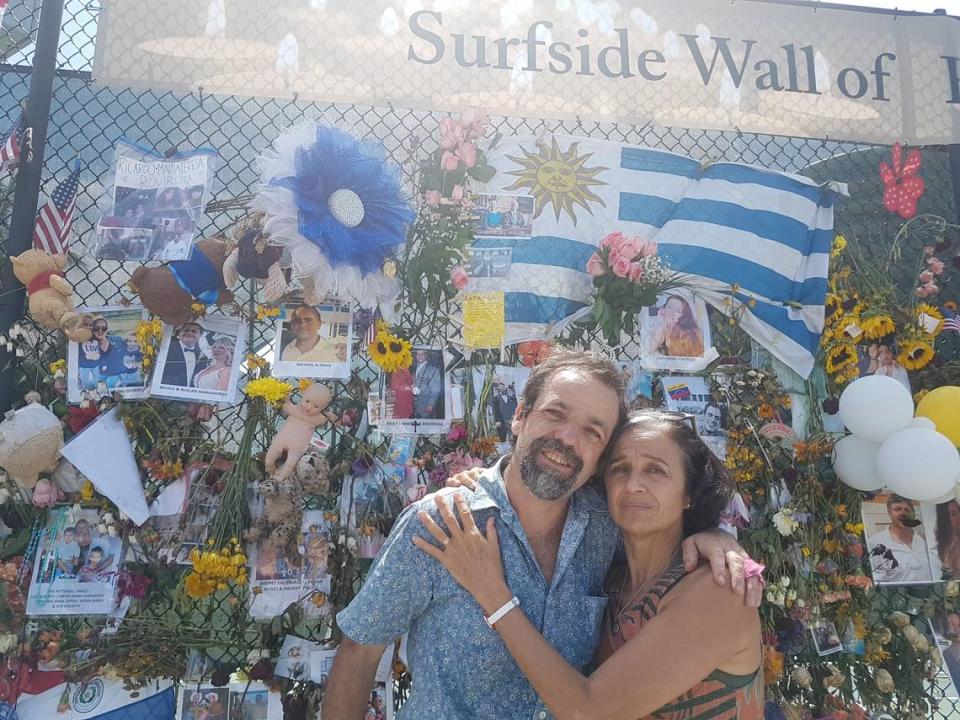 Bernardo and Maria Inés Camou in front of the memorial they made in honor of their sister, Maria Gabriela Camou, who died in the Champlain Towers South collapse.
