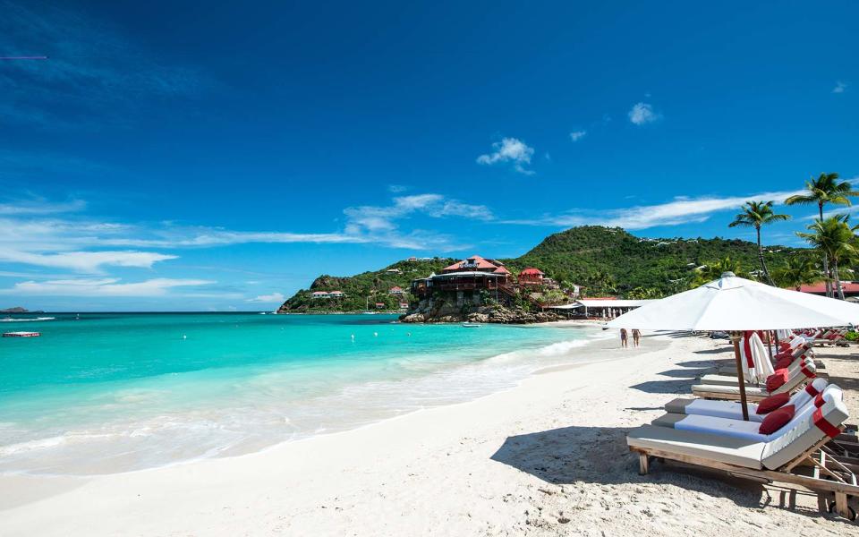 <p>The Caribbean charm, European influence and overarching natural beauty of <a rel="nofollow noopener" href="http://www.travelandleisure.com/travel-guide/st-barts" target="_blank" data-ylk="slk:St. Barts;elm:context_link;itc:0;sec:content-canvas" class="link ">St. Barts</a> is an incredible combination, which is perhaps why honeymooners and couples continue to flock here in droves, despite the heftier price tags. On the island, 14 beaches await and the best include Anse des Flamands for the rolling white sands and verdant greenery, Baie de St-Jean for the beachside restaurants like <a rel="nofollow noopener" href="http://www.travelandleisure.com/travel-guide/baie-de-st-jean/restaurants/on-the-rocks" target="_blank" data-ylk="slk:On The Rocks;elm:context_link;itc:0;sec:content-canvas" class="link ">On The Rocks</a>, and Anse de Grand Cul-de-Sac for the watersports. If you’re after a romantic setting without all the grandeur, try intimate boutique <a rel="nofollow noopener" href="http://www.st-barths.com/tom-beach-hotel/en/home.html" target="_blank" data-ylk="slk:Tom Beach Hotel;elm:context_link;itc:0;sec:content-canvas" class="link ">Tom Beach Hotel</a>.</p>