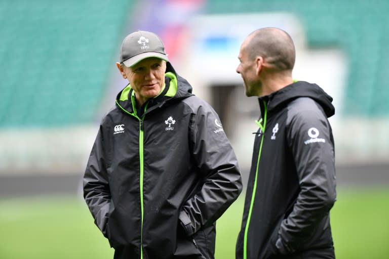 Joe Schmidt (L) became only the third coach to guide the Irish to a Grand Slam with the simple message "get out and play lads"