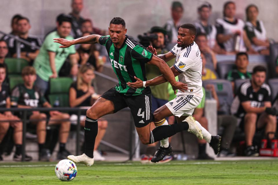 Austin FC defender Ruben Gabrielsen is grabbed by LA Galaxy forward Samuel Grandsir during El Tree's 1-0 loss Sunday. A key offseason signing, Gabrielsen has helped the team allow only nine goals in 10 games, fifth fewest in MLS.