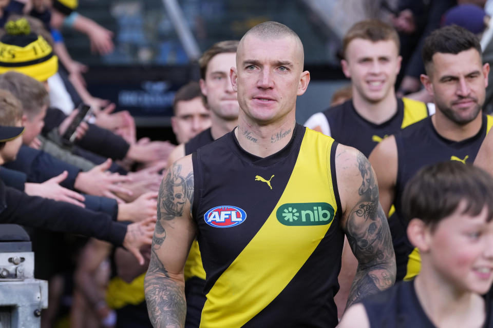 Dustin Martin walks out on the field.