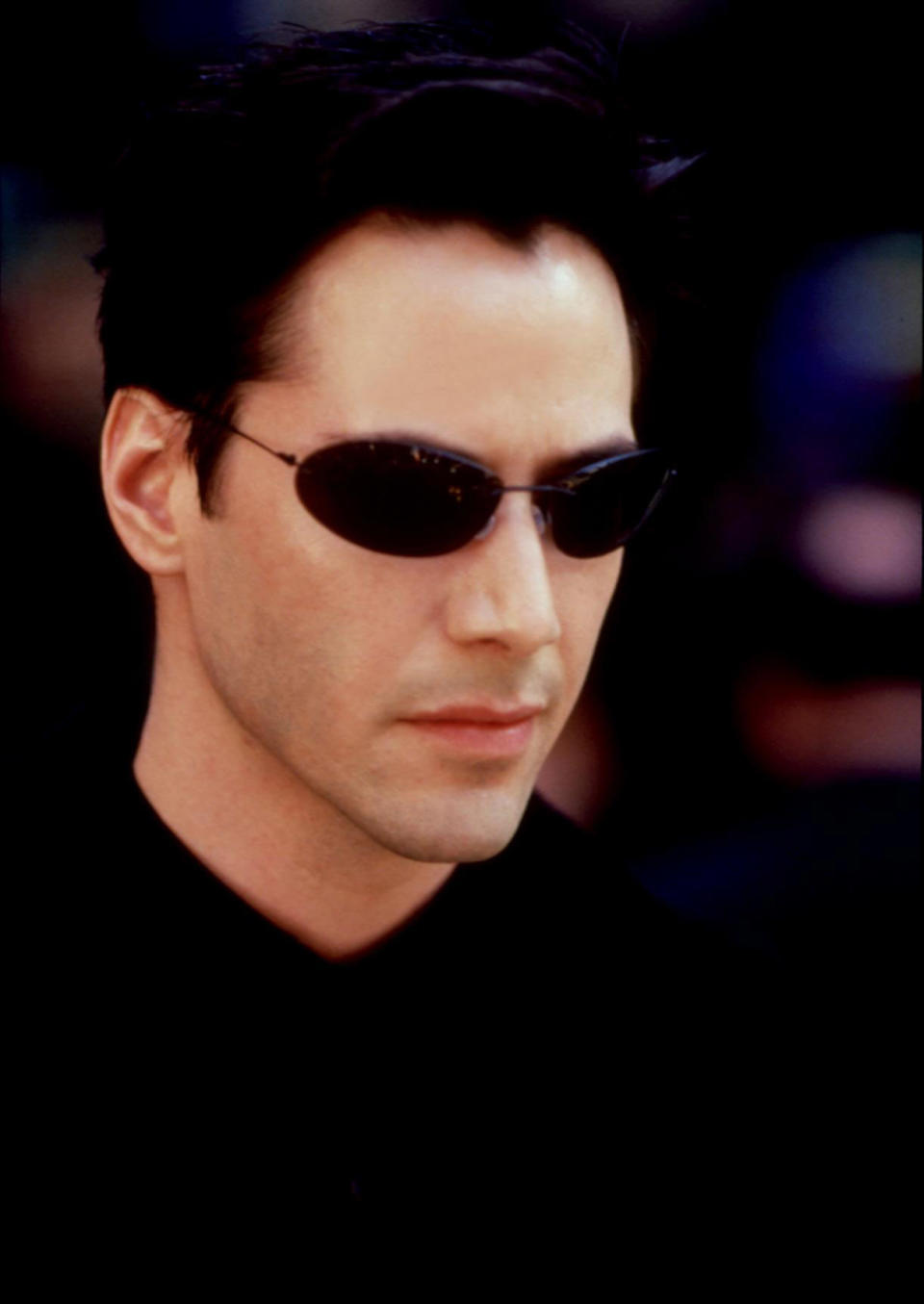 Close-up of Keanu Reeves wearing sunglasses