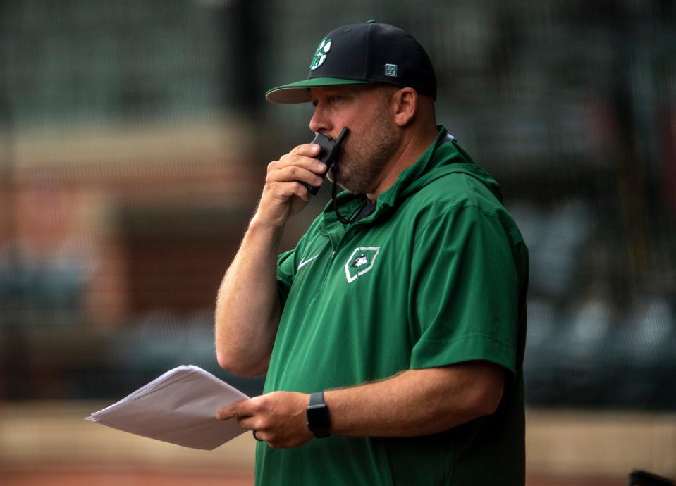 North Pitching Coach Jesse Simmons communicates to North catcher Gabe Wilke (1) as the Huskies play the Mater Dei Wildcats at Bosse Field in Evansville, Ind., Thursday, April 25, 2024.