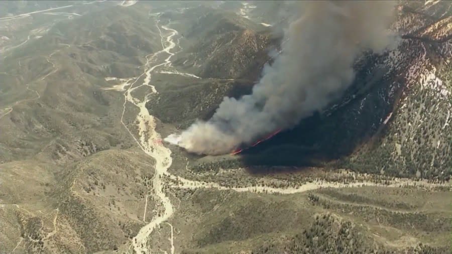 A large wildfire burns in Riverside County, California. (KTLA)