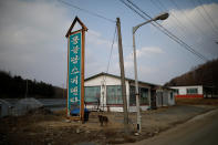 <p>An abandoned ski rental shop stands in front of the Alps Ski Resort located near the demilitarized zone separating the two Koreas in Goseong, South Korea, Jan. 17, 2018. (Photo: Kim Hong-Ji/Reuters) </p>