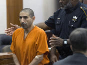 Robert Solis, 47, who is accused in the shooting death of Harris County Deputy Sandeep Dhaliwal, appears for Judge Chris Morton at the Harris County Criminal Courthouse on Monday, Sept. 30, 2019, in Houston. (Yi-Chin Lee/Houston Chronicle via AP)