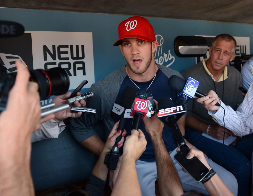 LOS ANGELES, CA - APRIL 28: Bryce Harper #34 of the Washington Nationals speaks to the media in his major league debut during practice before the game against the Los Angeles Dodgers at Dodger Stadium on April 28, 2012 in Los Angeles, California. (Photo by Harry How/Getty Images)