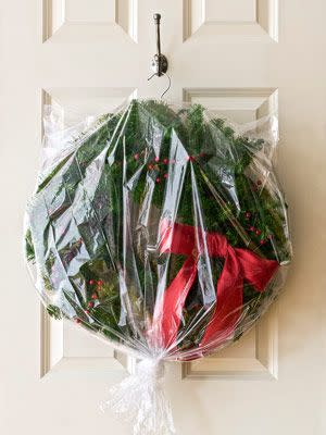 Use a Hanger to Store Wreaths