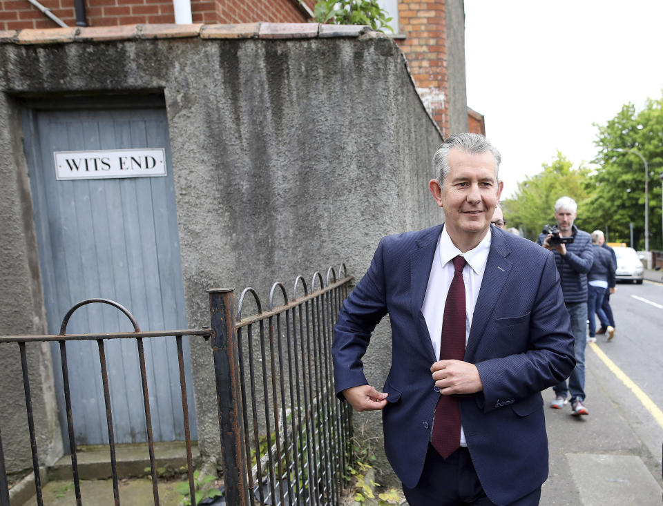 Democratic Unionist Party members Edwin Poots leaves the party headquarters in east Belfast after voting took place to elect a new leader on Friday May 14, 2021. Edwin Poots and Jeffrey Donaldson are running to replace Arlene Foster. (AP Photo/Peter Morrison)