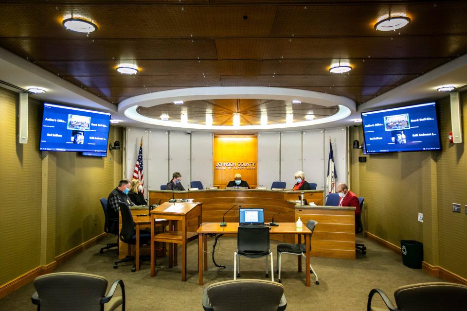 Johnson County Supervisors, from left, Pat Heiden, Royceann Porter, chairperson of the Johnson County Board of Supervisors, and Lisa Green-Douglass speak during a formal meeting, Thursday, Jan. 6, 2022, at the Johnson County Administration Building in Iowa City, Iowa.