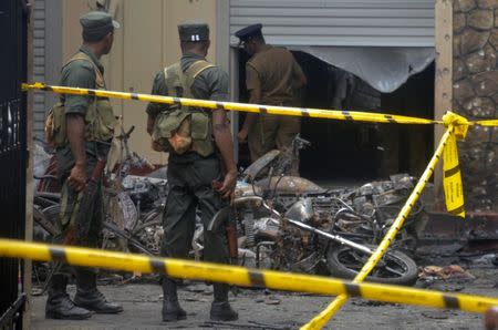 Sri Lankan military stand guard near the explosion site at a church in Batticaloa, Sri Lanka April 21, 2019. REUTERS/Stringer