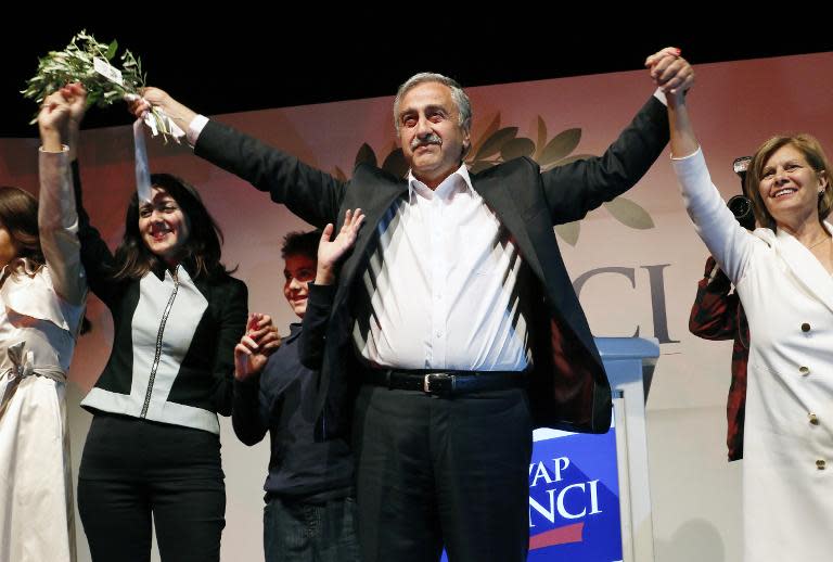 Newly elected president of the self-proclaimed Turkish Republic of Northern Cyprus, Mustafa Akinci, celebrates his victory on April 26, 2015 in Nicosia