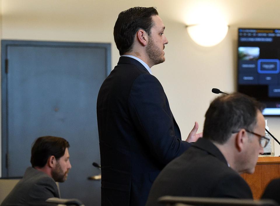 Former Loveland police officer Austin Hopp speaks to the judge during his sentencing hearing Thursday. Hopp was sentenced to five years in prison with three years of mandatory parole after pleading guilty to second-degree assault stemming from his 2020 arrest of Karen Garner.