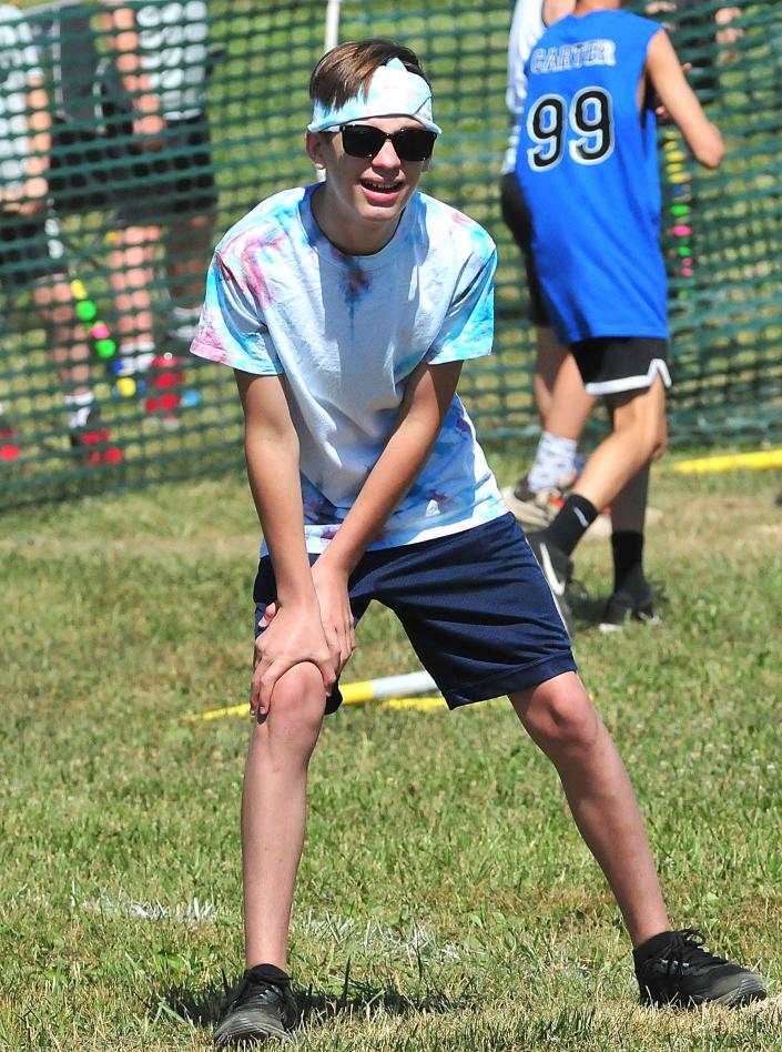 Huck Fuller waits at first base during the Wifflefest XXIII elementary and middle school tournaments Saturday, July 2, 2022 at Southview Grace Brethren Church.