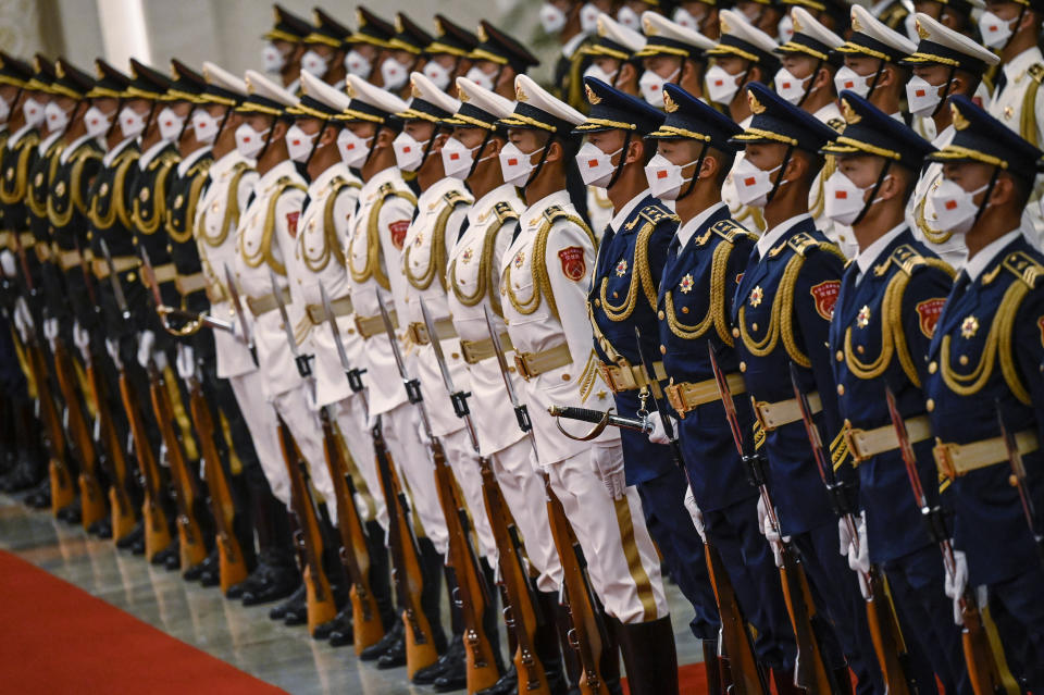 Chinese honor guards prepare for the arrival of Palestinian President Mahmoud Abbas and China's President Xi Jinping at the Great Hall of the People in Beijing Wednesday, June 14, 2023. (Jade Gao/Pool Photo via AP)