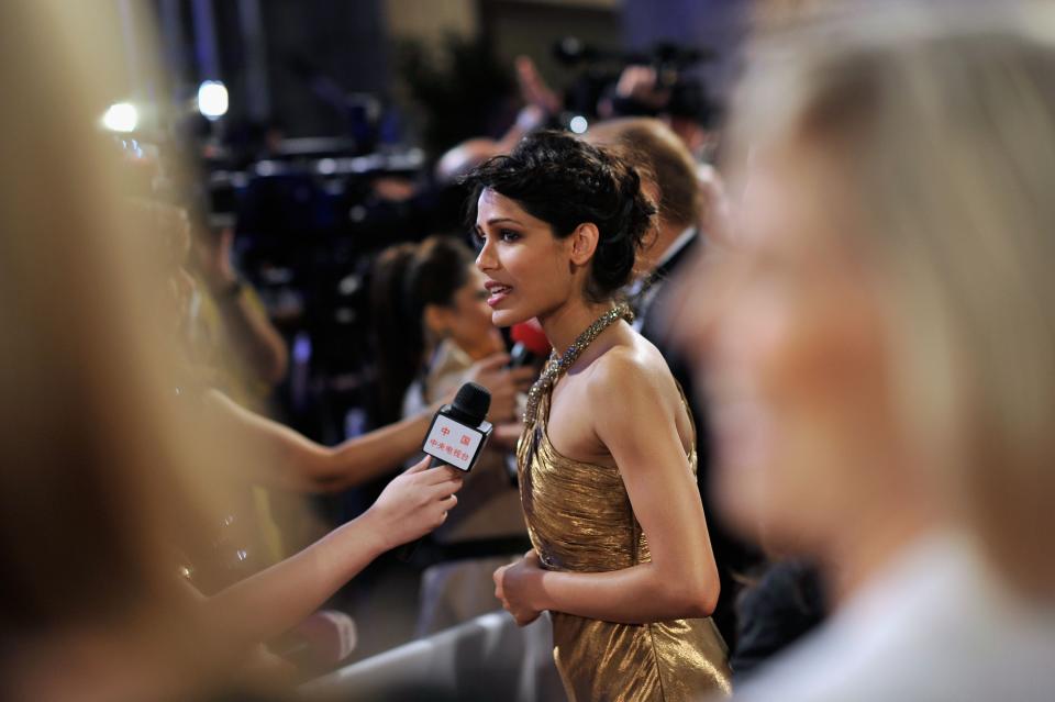 DUBAI, UNITED ARAB EMIRATES - DECEMBER 09: Actress Freida Pinto attends the "Life of PI" Opening Gala during day one of the 9th Annual Dubai International Film Festival held at the Madinat Jumeriah Complex on December 9, 2012 in Dubai, United Arab Emirates. (Photo by Gareth Cattermole/Getty Images for DIFF)