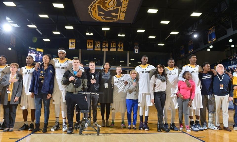 Kent State players each invited a fan to stand with them during Wednesday's national anthem (via Kent State Athletics)