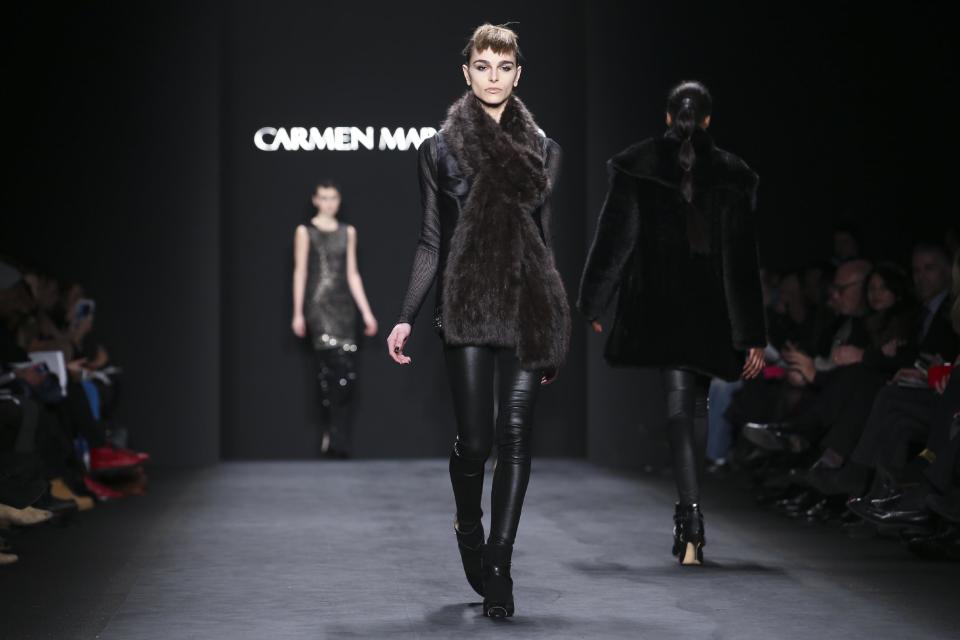 The Carmen Marc Valvo Fall 2014 collection is modeled during Fashion Week, Friday, Feb. 7, 2014, in New York. (AP Photo/John Minchillo)