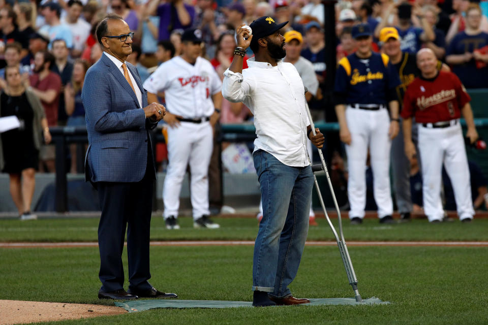 Special Agent David Bailey throws out the first pitch