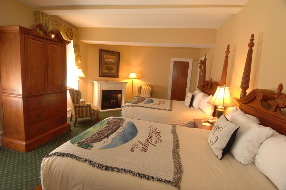 This undated photo provided by The Mimslyn Inn in Luray, Va., shows a guest room at the 82-year-old inn, which was closed for a year in 2007 while undergoing a $3.5 million renovation, including a complete mechanical and cosmetic upgrade. It's important to do your homework when planning a stay at a historic hotel or inn, because while some like The Mimslyn have modernized, others may count on their history or location to appeal to guests who don't mind rustic or old-fashioned accommodations. (AP Photo/Mimsyln Inn)