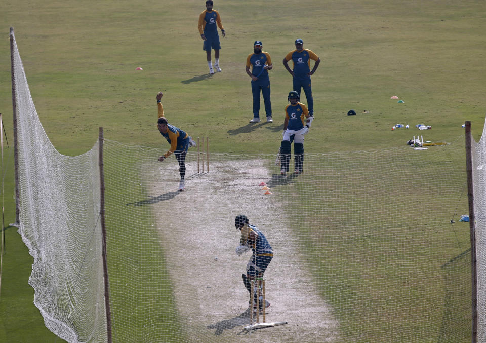 Pakistan cricket team players attend a practice session at the Pindi Cricket Stadium, in Rawalpindi, Pakistan, Tuesday, Oct. 27, 2020. The Zimbabwe cricket team is in Pakistan to play three ODIs and three Twenty20 International match series,that begin with the first ODI on Friday. (AP Photo/Anjum Naveed)