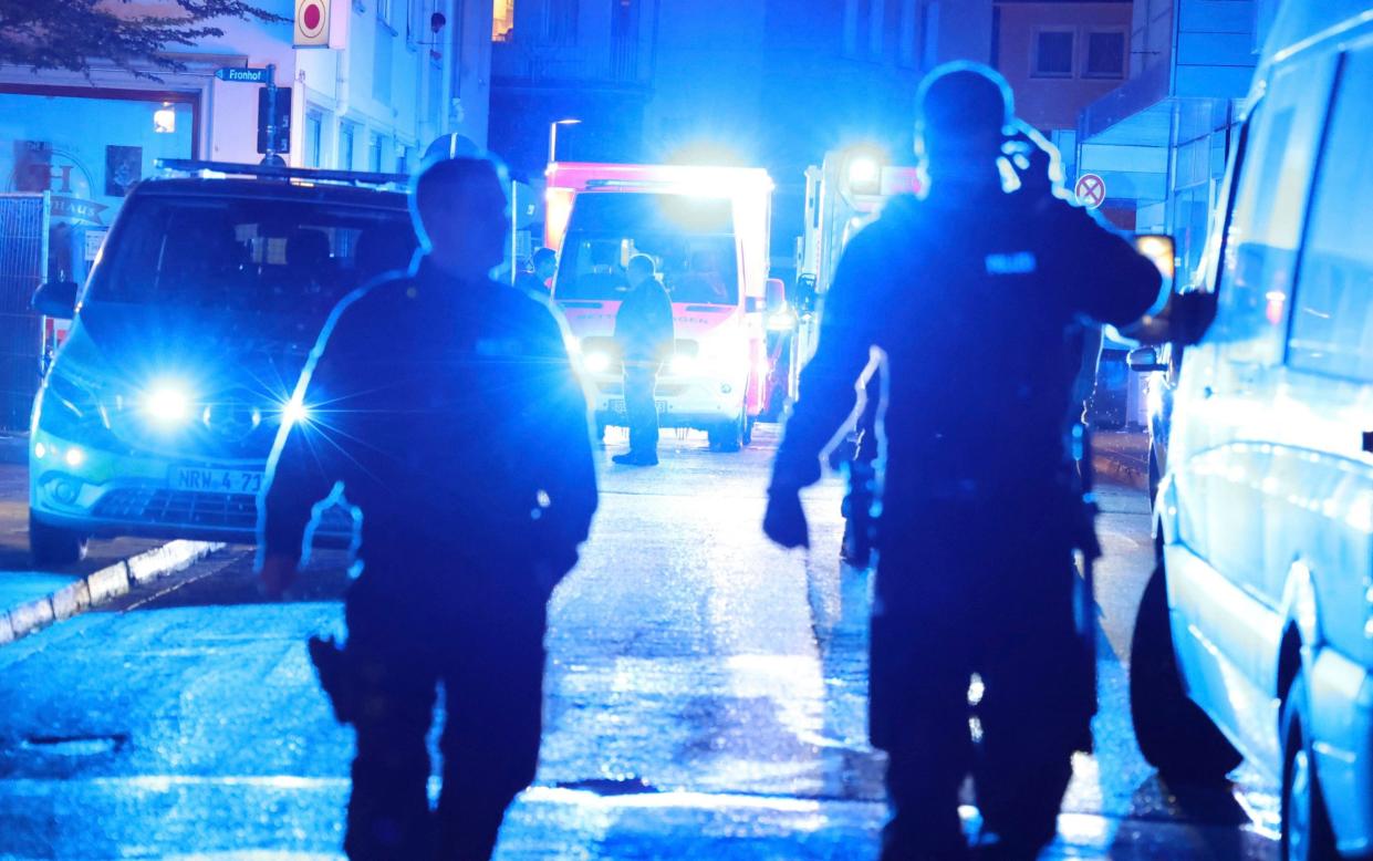 Police and ambulances near the scene of the knife attack in Soligen