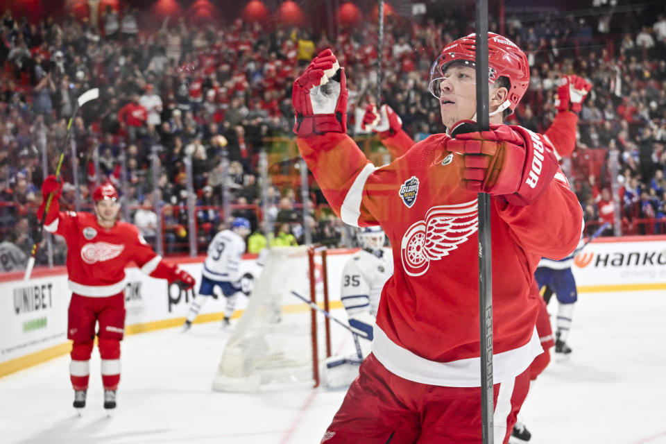 Detroit's Lucas Raymond celebrates scoring during the NHL Global Series Sweden ice hockey match between Toronto Maple Leafs and Detroit Red Wings and at Avicii Arena in Stockholm, Sweden, Friday Nov. 17, 2023. (Henrik Montgomery/TT News Agency via AP)