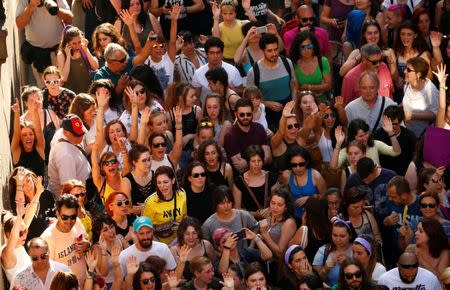 Protesters attend a demonstration against the release on bail of five men known as the "Wolf Pack" cleared of gang rape of a teenager and convicted of a lesser crime of sexual abuse in Madrid, Spain, June 22, 2018. REUTERS/Javier Barbancho