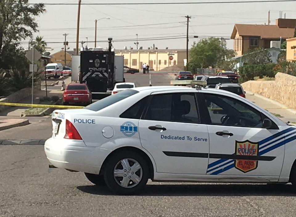 El Paso police cars and crime-scene tape block the street as detectives investigate the shooting death of a man found on a sidewalk on Monday, July 8, 2024, on Byron Street in Northeast El Paso.