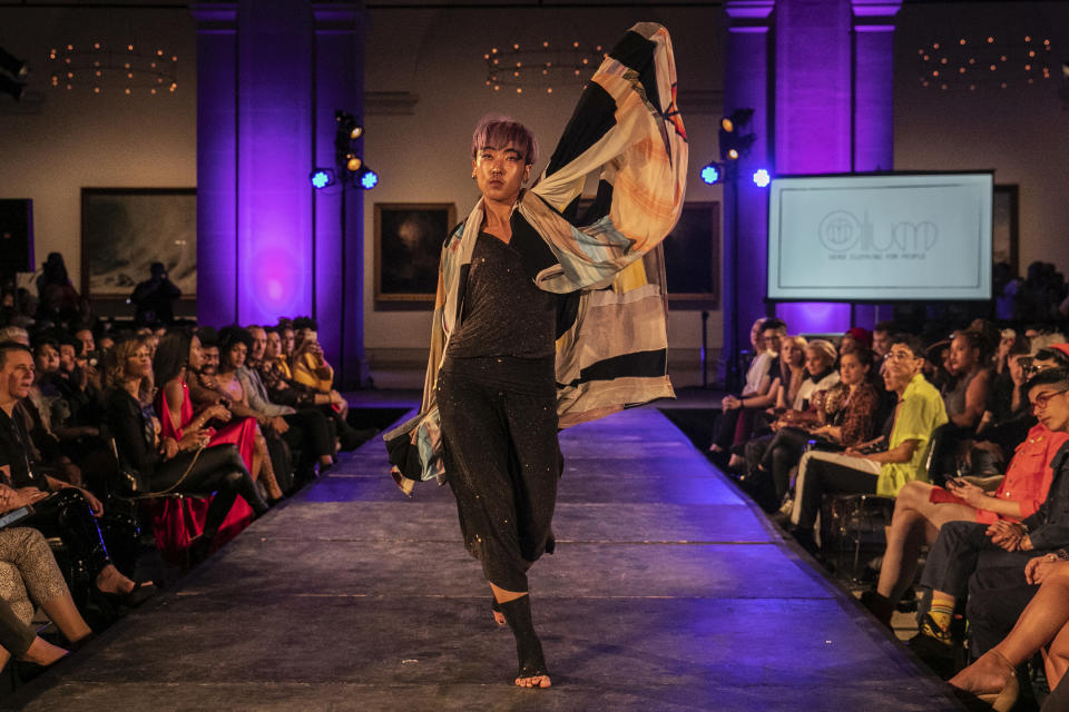 The Cilium collection is modeled during the dapperQ fashion show at the Brooklyn Museum on Thursday Sept. 5, 2019, in New York. (AP Photo/Jeenah Moon)