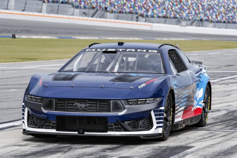 The 2024 Mustang Dark Horse set for the NASCAR Cup Series sits on pit road