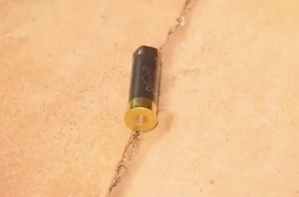 A shotgun shell on the cement at the Palms Motel in Darwin where Ben Hoffmann allegedly shot guests. Source: Nine News