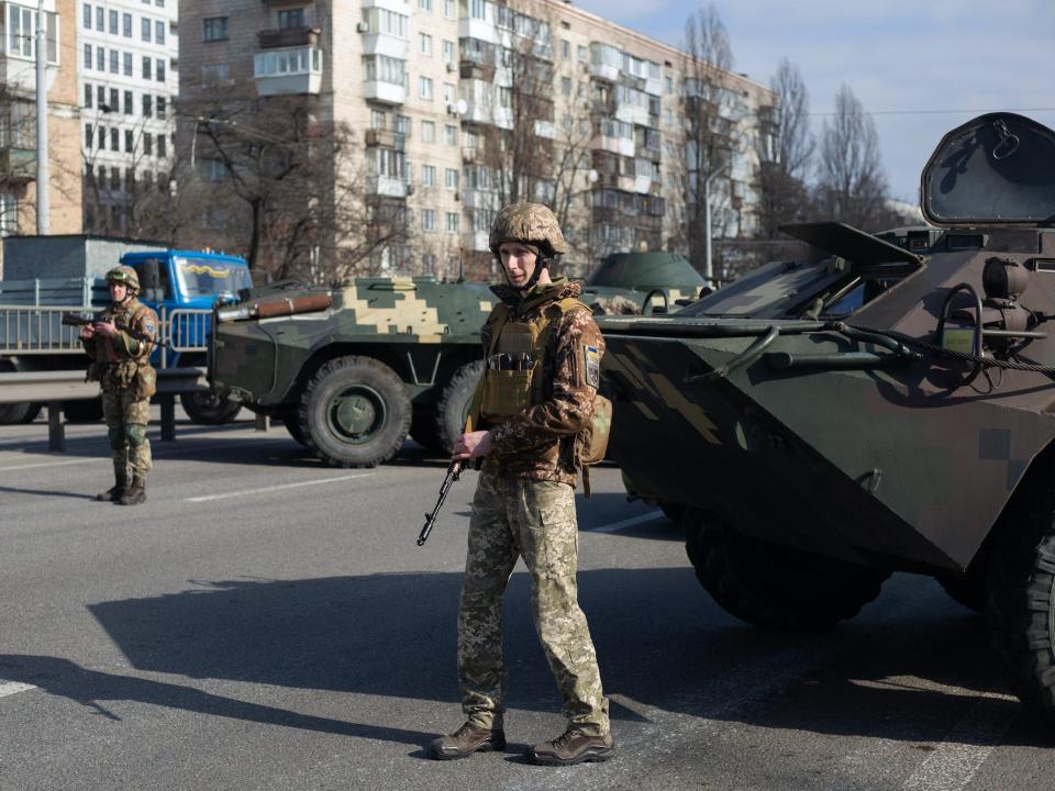 Soldiers guard Kyiv in Ukraine during Russia's invasion on February 25, 2022.